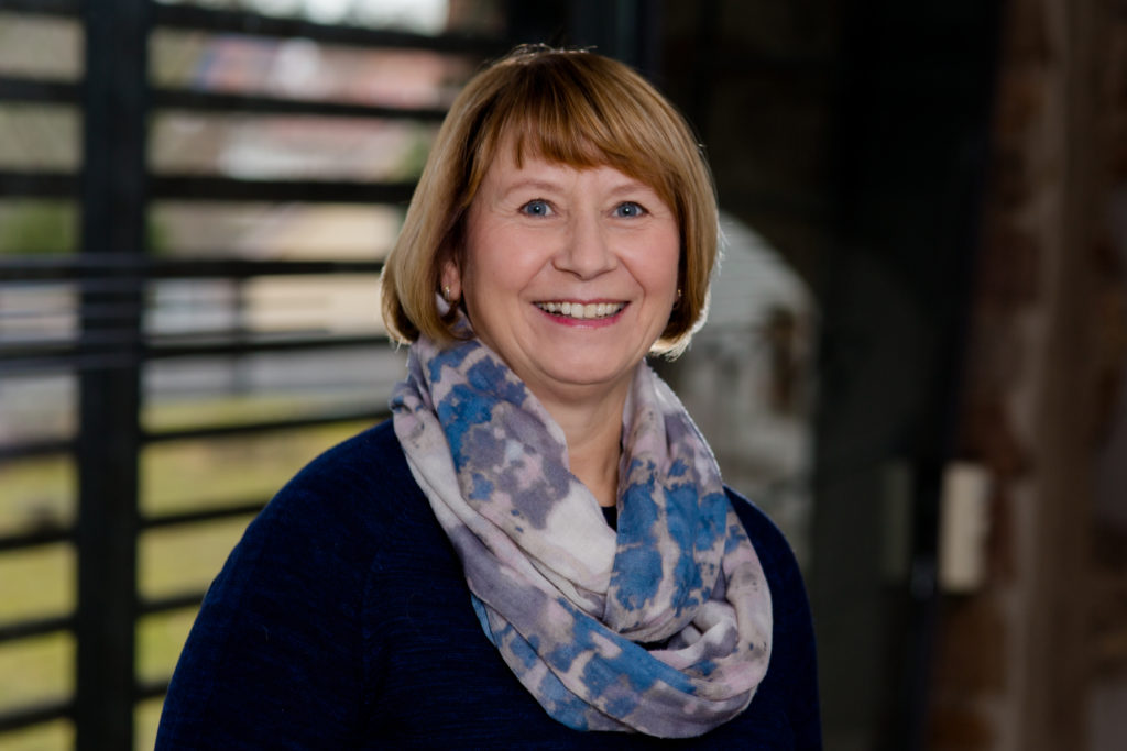 Gesicht der zuständigen Mitarbeiterin für Buchhaltung des Tagungshauses.